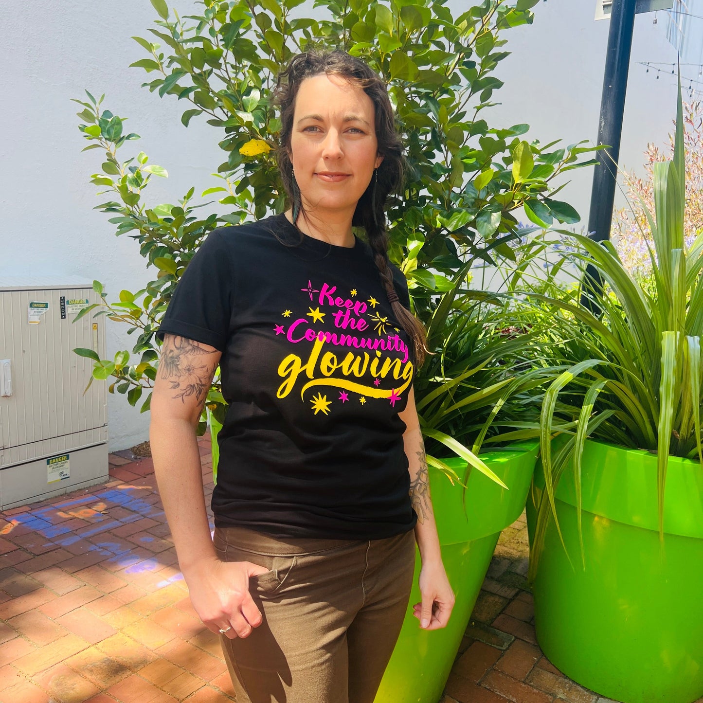 KEEP THE COMMUNITY GLOWING T SHIRT