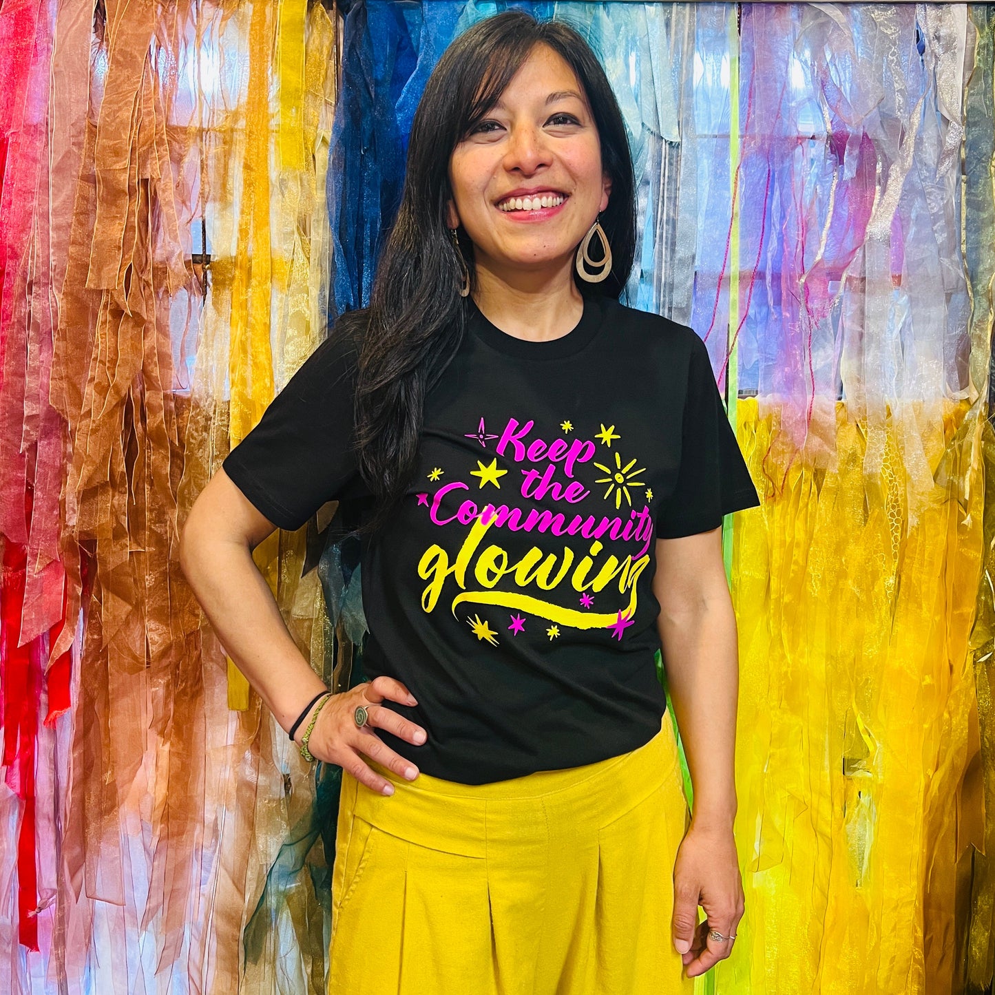 KEEP THE COMMUNITY GLOWING T SHIRT